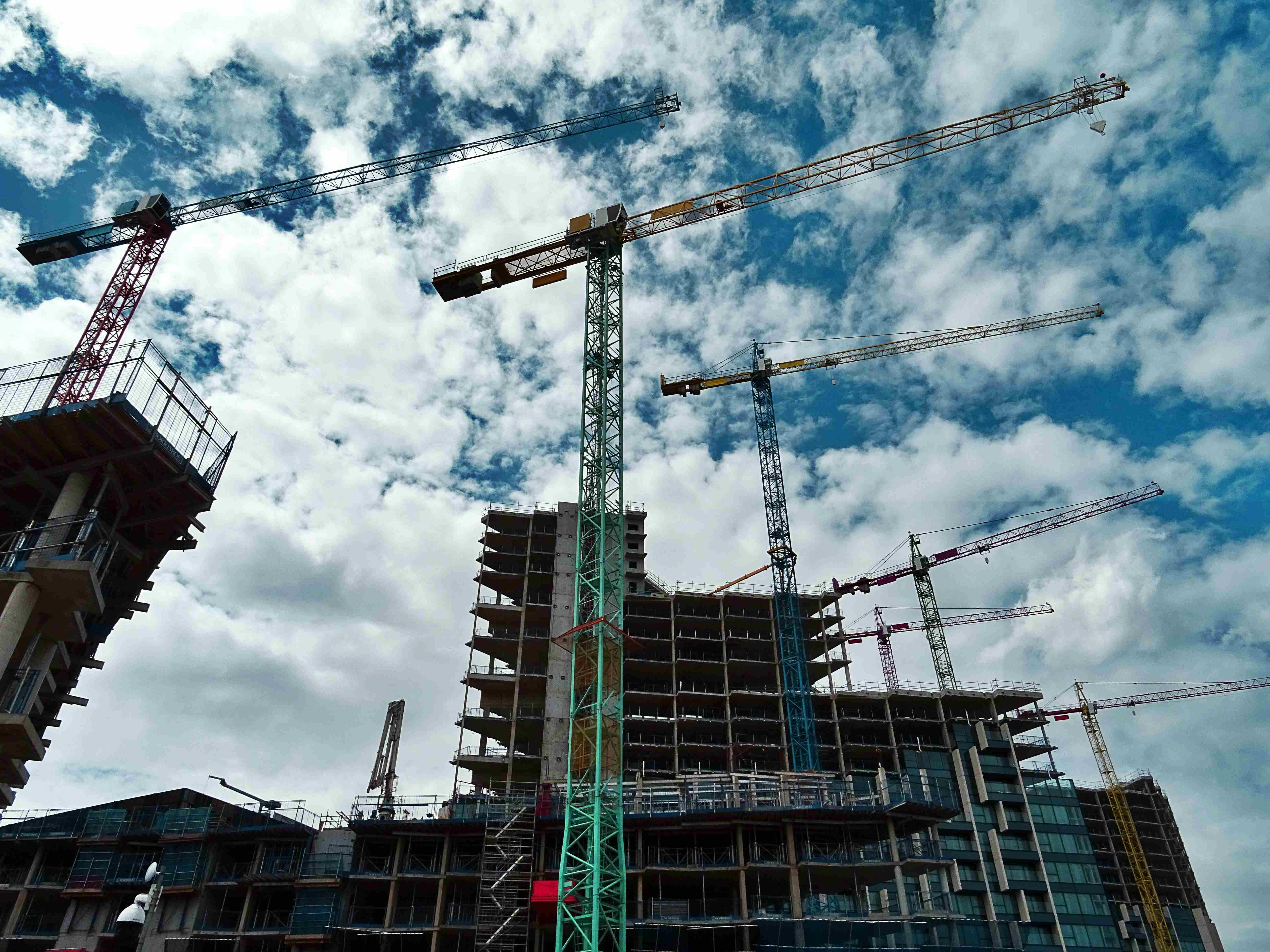 Large-scale construction site with tower cranes